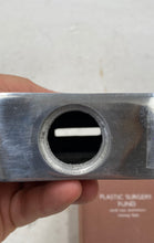 Load image into Gallery viewer, PLASTIC SURGERY FUND Bombay Duck London Sand Cast Aluminum Money Box

